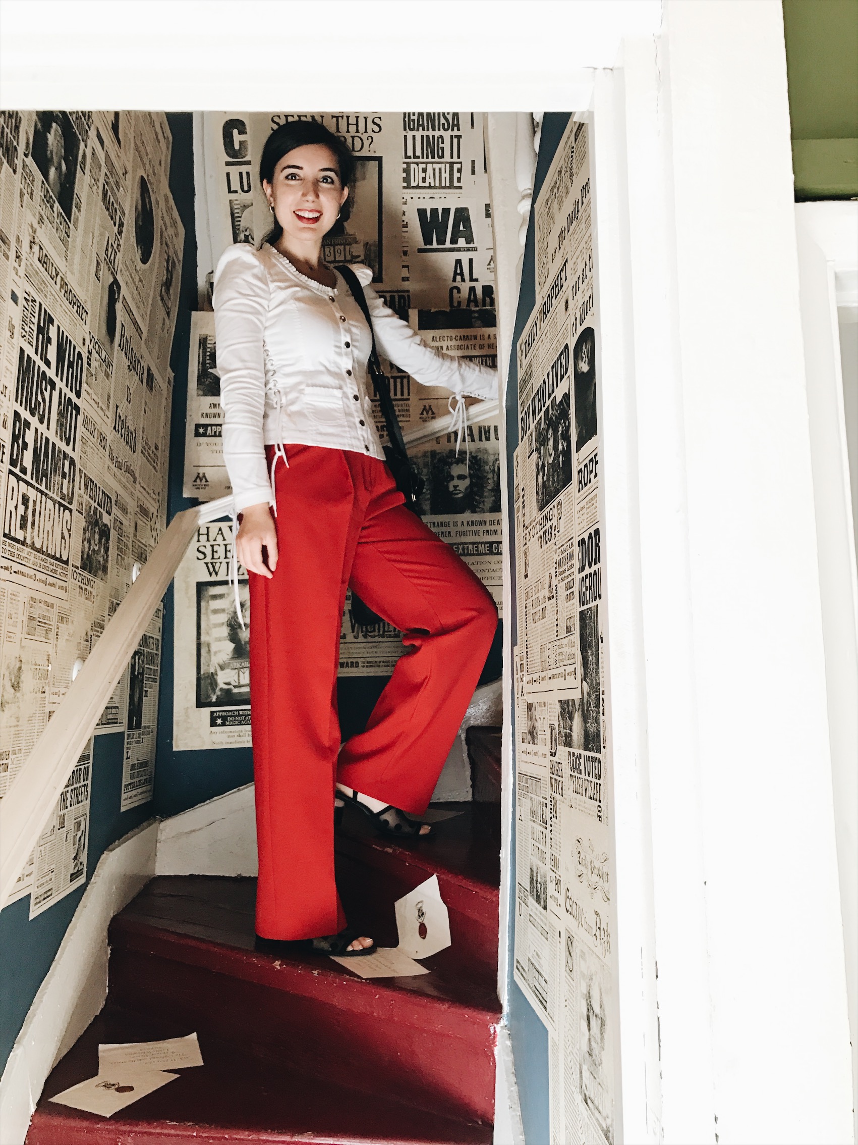 red trousers, MANGO, Betsey Johnson, Zara, red lips, high waist pants, Minilima London, Harry Potter and the Cursed Child, lookbook, fashion blogger, white corset top, Harry Potter, , eighteenth century, ootd, outfit of the day, look of the day, London, UK, United Kingdom, library, travel blogger, wanderlust, London lookbook, London fashion, London blogger