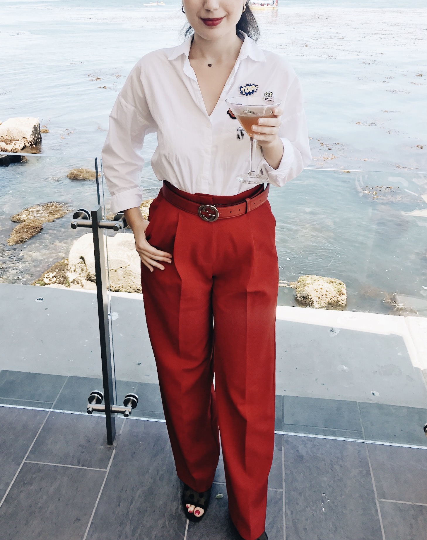 fashion blogger, red, red lips, red trousers, Monterey, CA, summer fashion, lookbook, outfit of the day, gold hoop earrings, oceanside, Schoooner's Monterey, blogger, ootd, lotd, fashion advice, button down top, Zara, Mango, Gucci belt