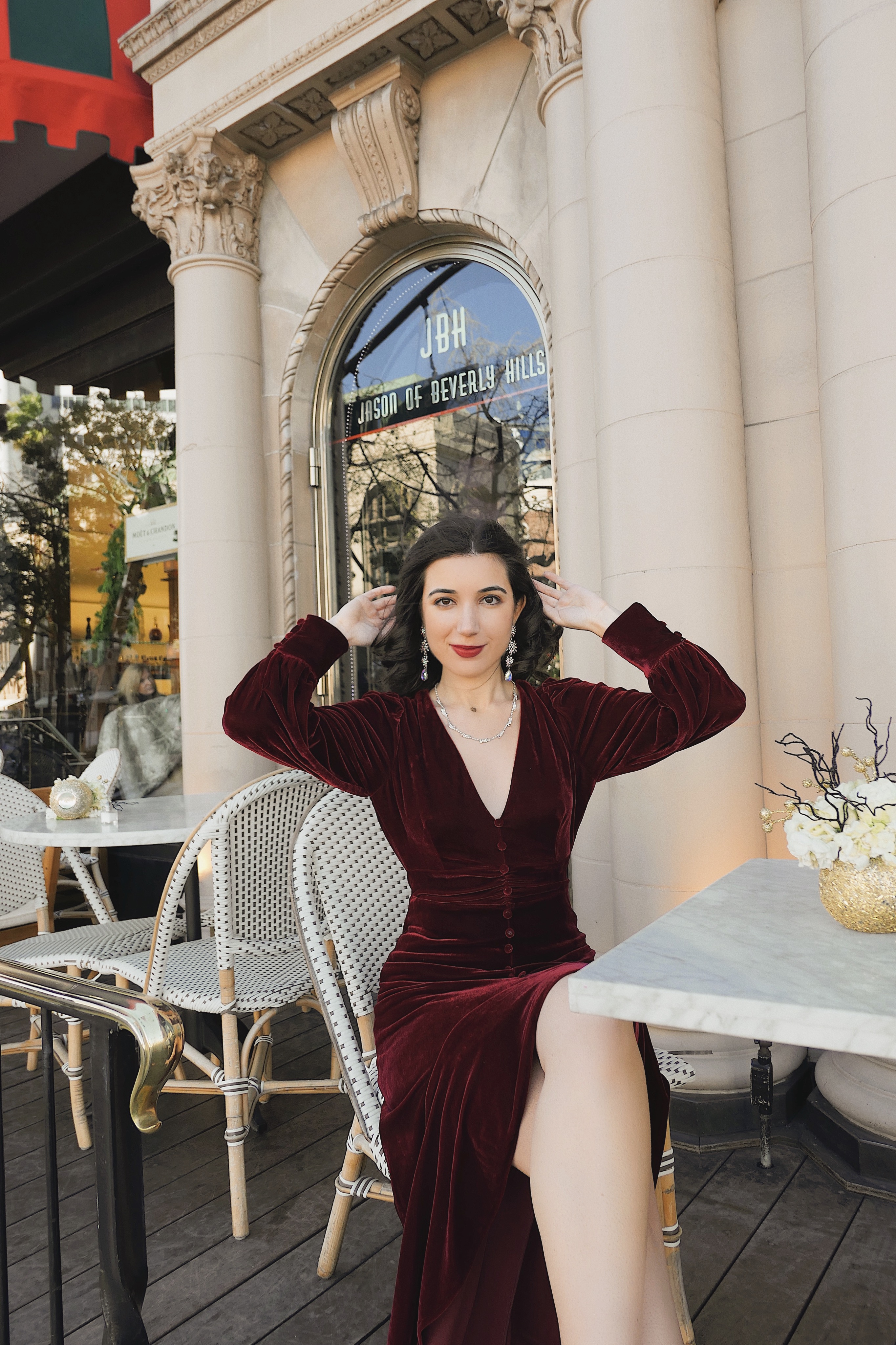 The Beverly Wilshire, red velvet, Christmas dress, Christmas outfit, gown, red velvet, fashion blogger, LA blogger, Beverly Hills, Christmas in Beverly Hills, Christmas in Los Angeles, high fashion, luxury, Edwardian, vintage, rhinestone necklace, rhinestone earrings, Nanamacs, Jeffrey Campbell shoes, curly hair, red lips