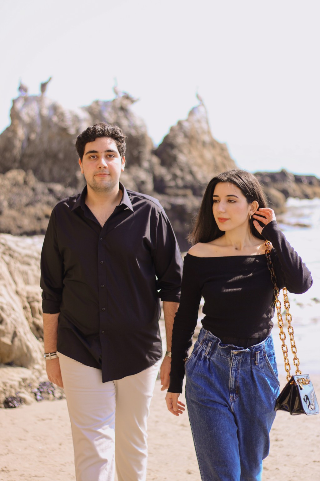 men's fashion, women's fashion, sibling style, brother and sister, winter editorial, beach photo shoot, beach fashion, Malibu, Malibu style, black top, mom jeans, khakis, lookbook, outfit of the day, matching outfits