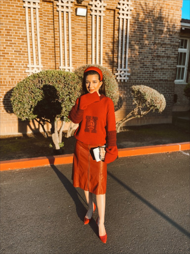 Tommy Hilfiger, preppy style, preppy, back to school style, fall fashion, high fashion, red sweater, oversized sweater, leather skirt, midi skirt, gold hoop earrings, red pumps