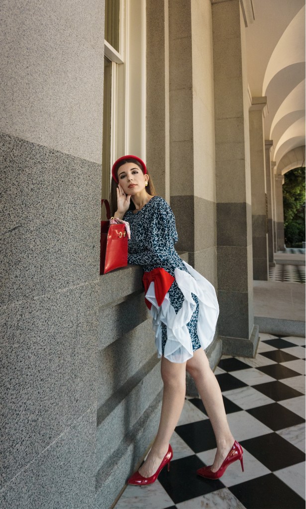I could not believe that I was walking in such an avant garde gown past a league of legislators and tourists. In cherry-red pumps reminiscent of Dorothy’s ruby slippers, I strutted across the checkered tiles outside the California State Capitol, in place of a yellow brick road.
